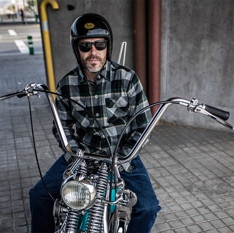 Guy wearing low-profile open-face helmet